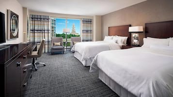 Down duvets, pillow-top beds, in-room safe, desk