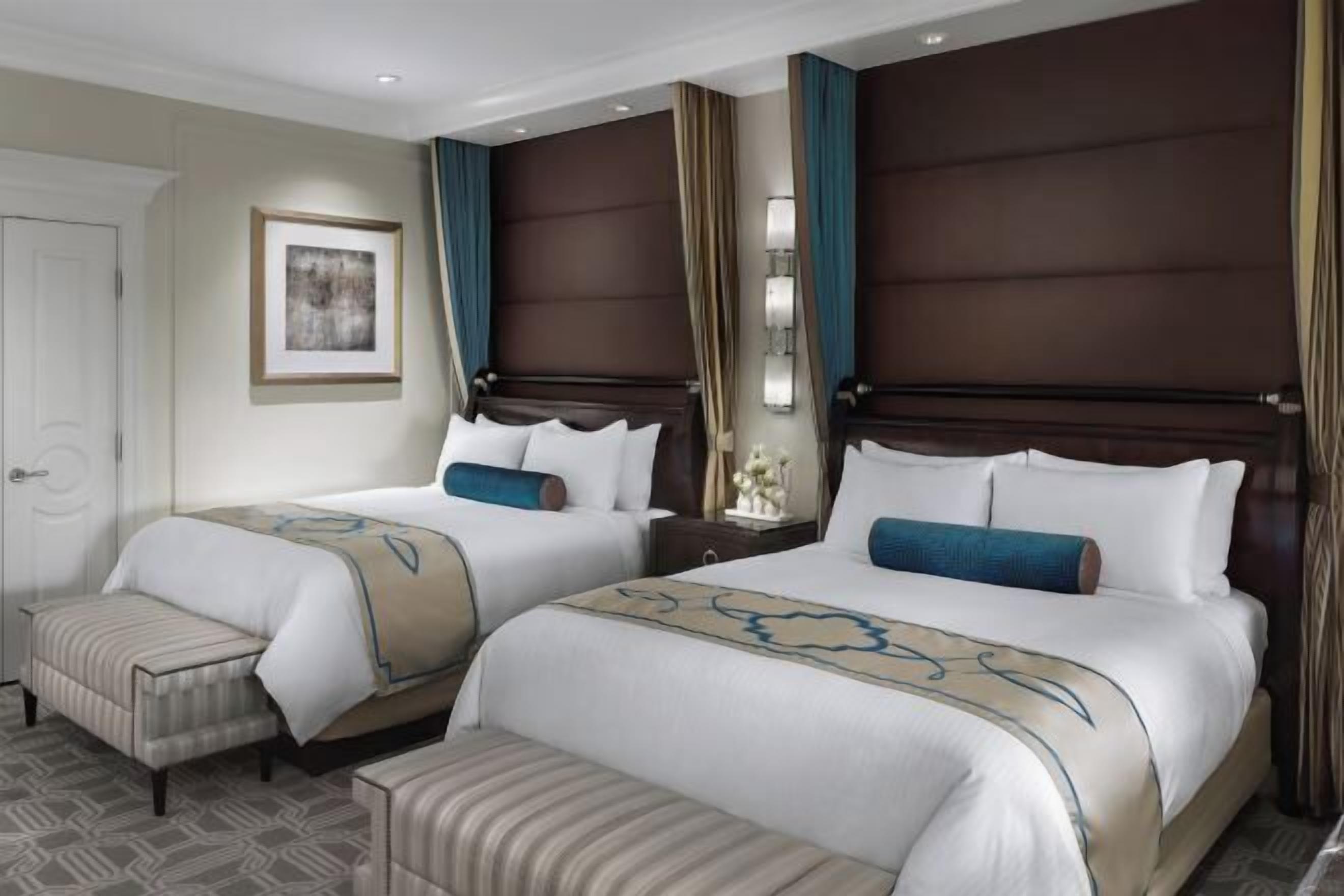 Luxe beddengoed, een minibar, een kluis op de kamer, een bureau