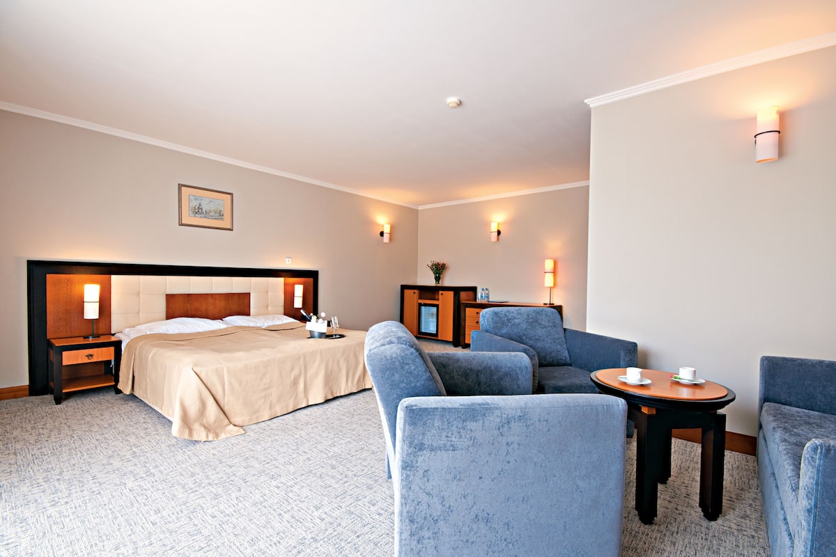 luxury double room | in-room safe, desk, iron/ironing board, cots/infant beds
