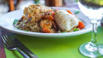 Breakfast, lunch, dinner served; beach views