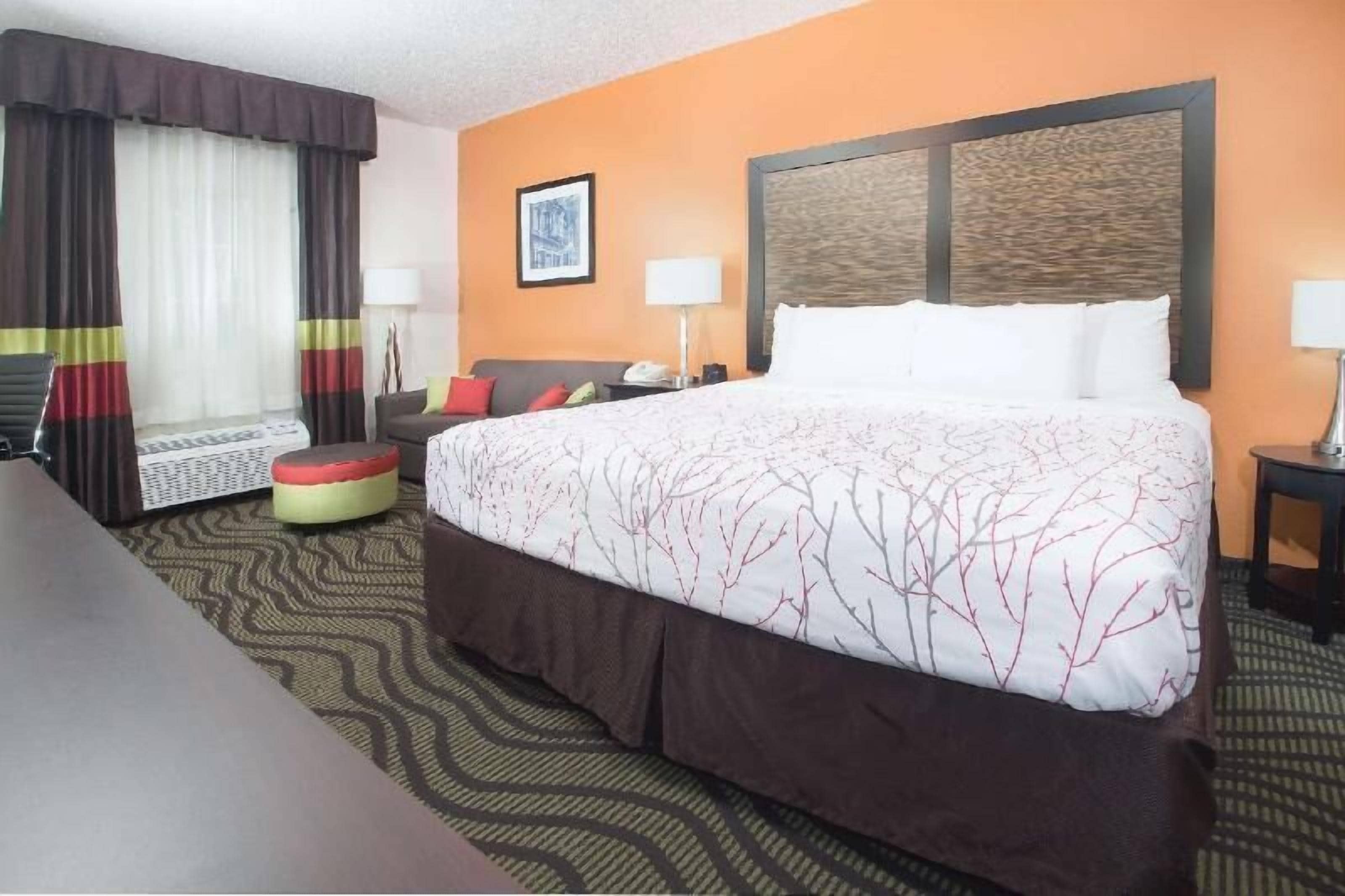Premium bedding, pillow-top beds, desk, laptop workspace
