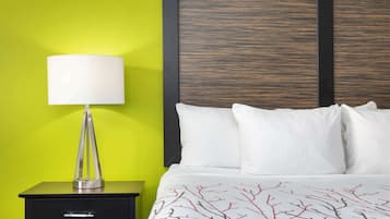 Premium bedding, pillow-top beds, desk, laptop workspace