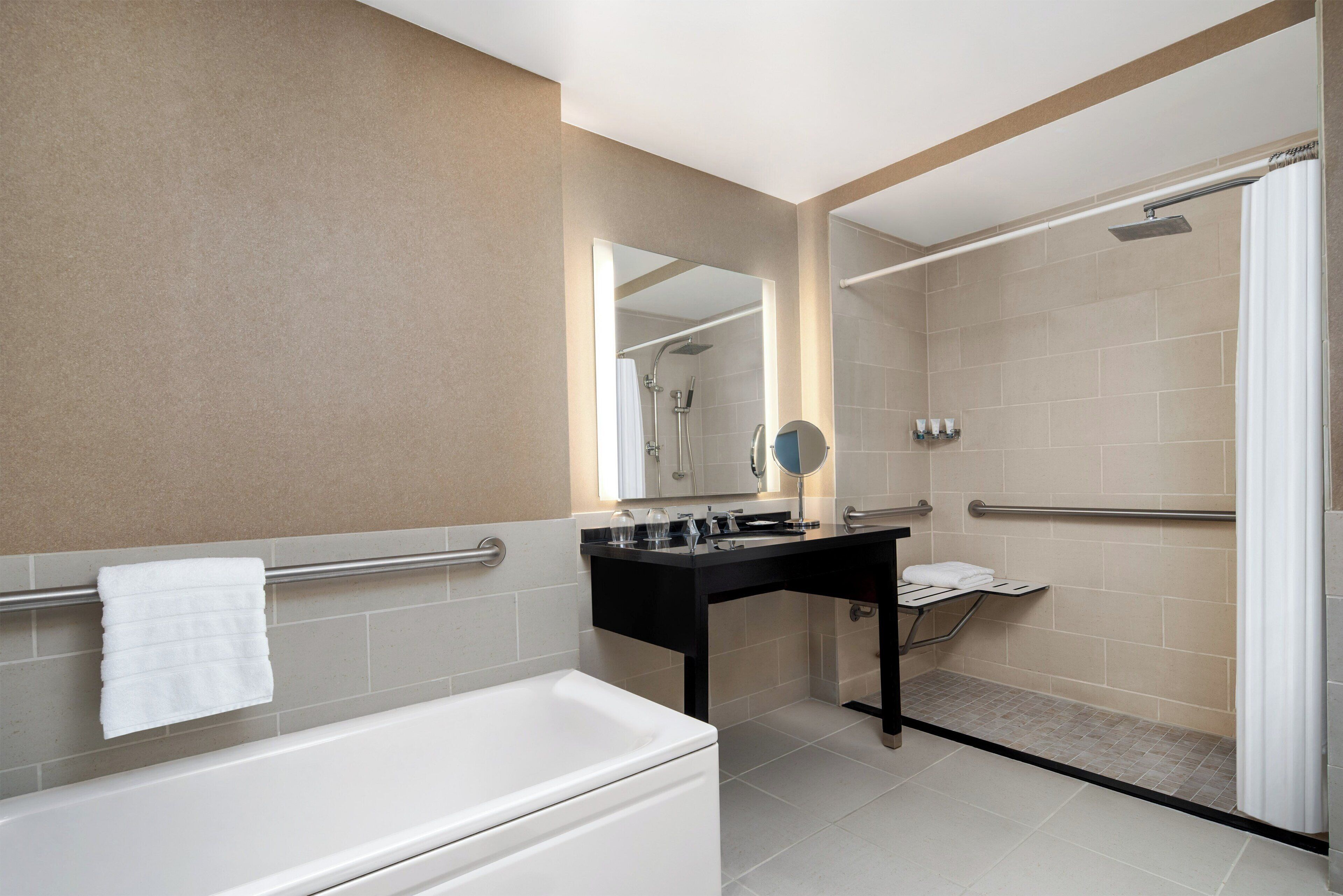 combined shower/bathtub, free toiletries, hair dryer, bathrobes