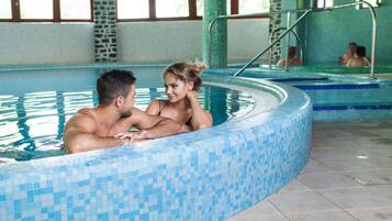 Indoor pool, seasonal outdoor pool, pool umbrellas, pool loungers