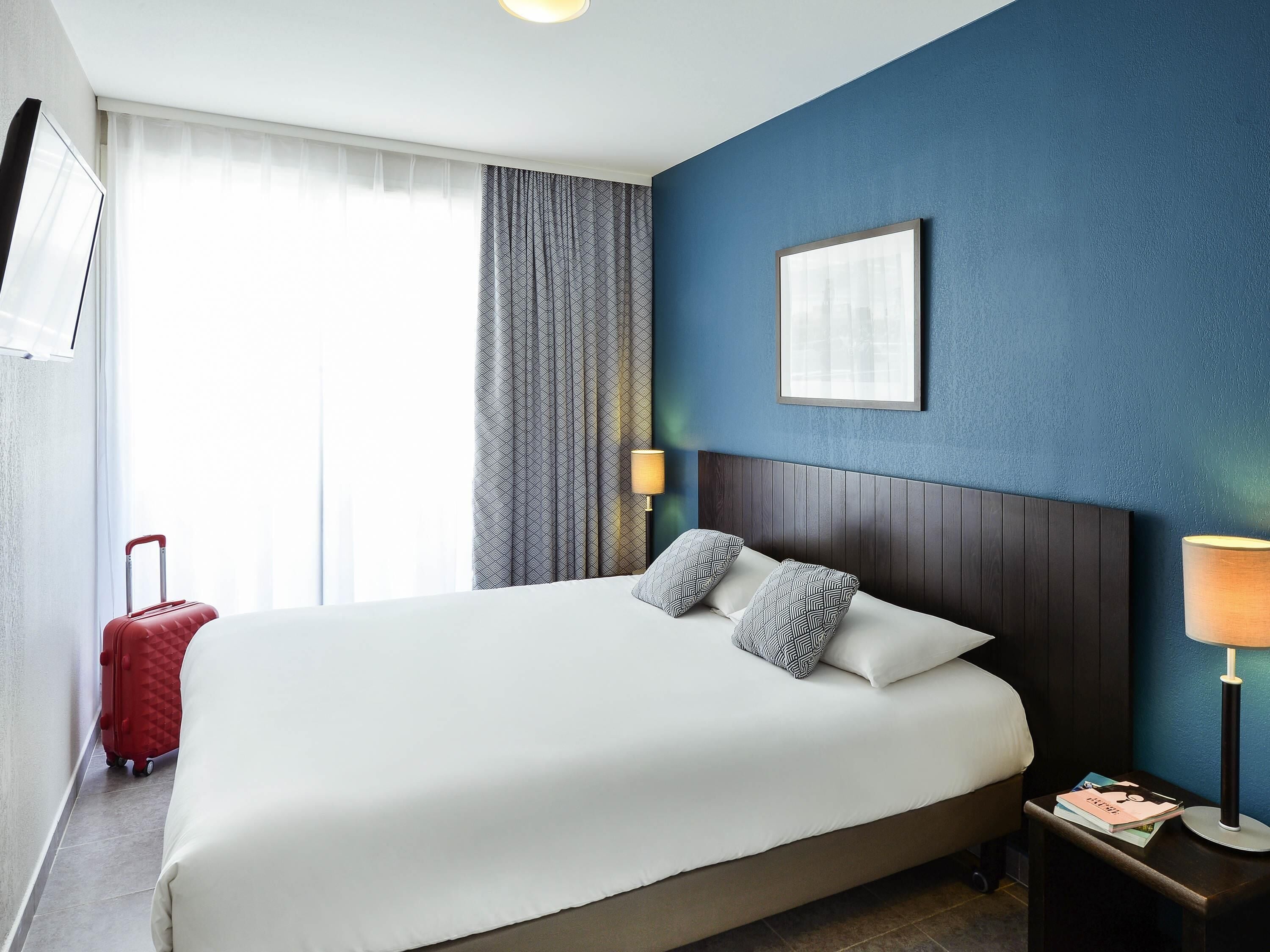 Leilighet, 1 soverom | Safe på rommet, skrivebord, skrivebord for bærbar PC og lydisolert