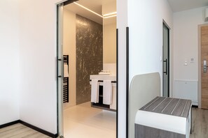 Shower, rainfall showerhead, hair dryer, towels