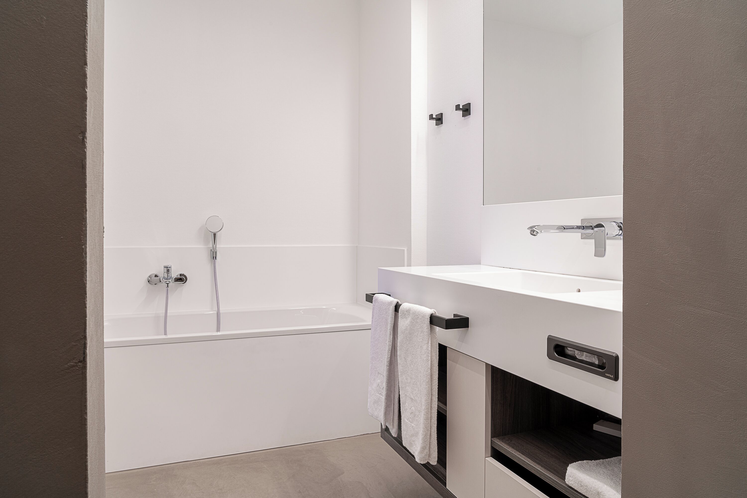 superior suite | bathroom | shower, rainfall showerhead, hair dryer, towels