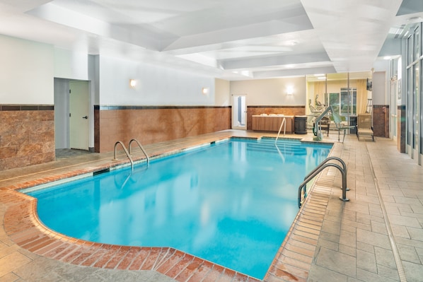 Indoor pool, open 7:00 AM to 10 PM, pool loungers