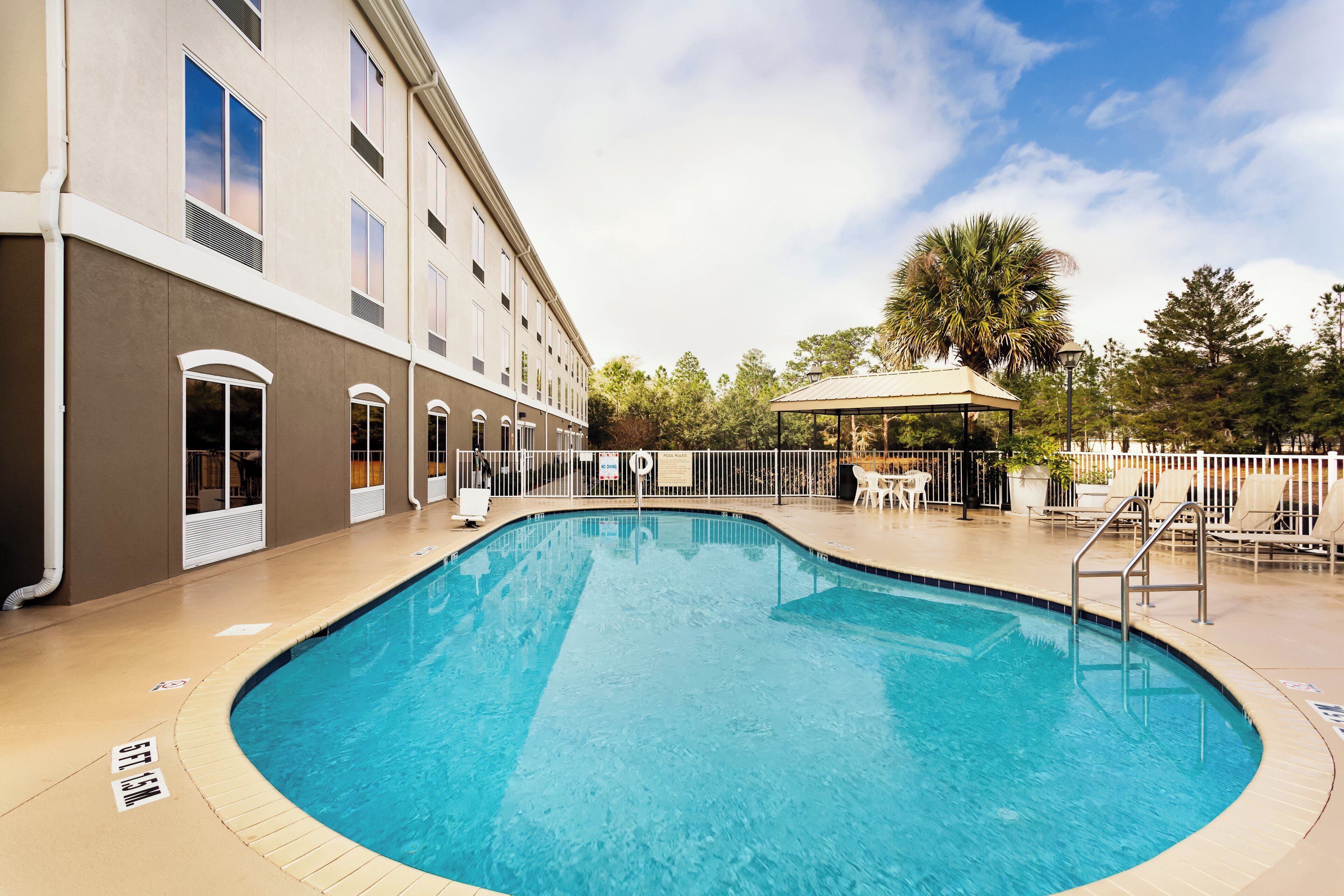 Outdoor pool, open 9:00 AM to 9:00 PM, pool umbrellas, sun loungers