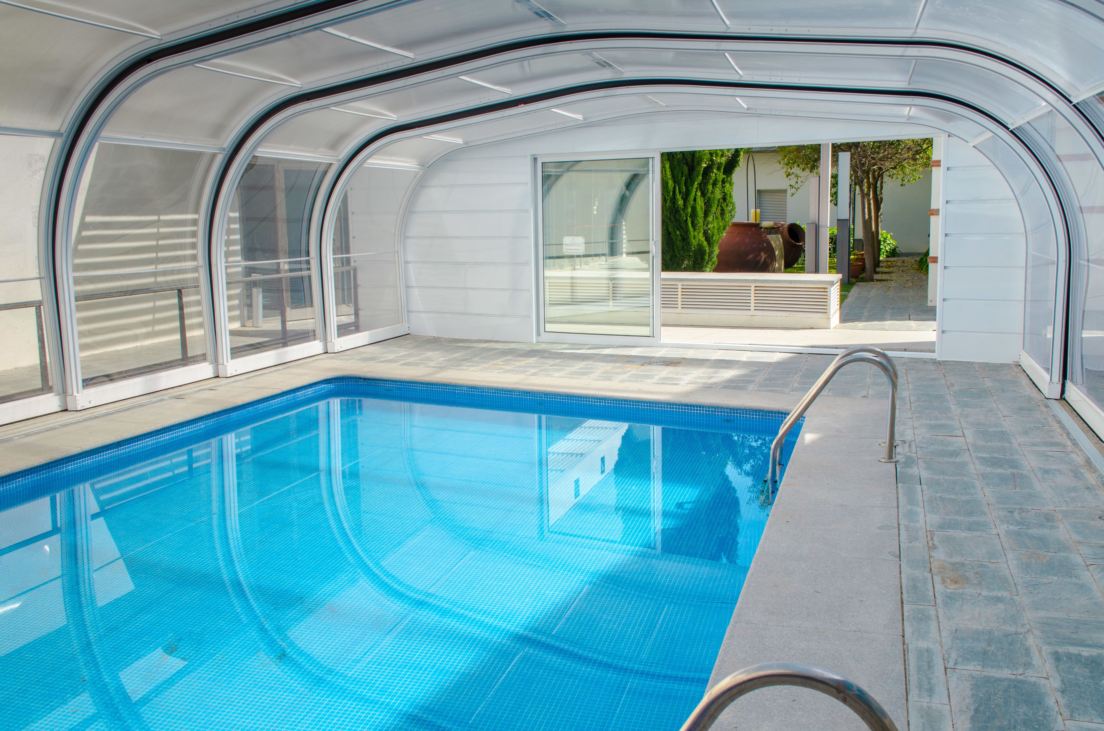 seasonal outdoor pool, open 11:00 am to 8:00 pm, pool loungers