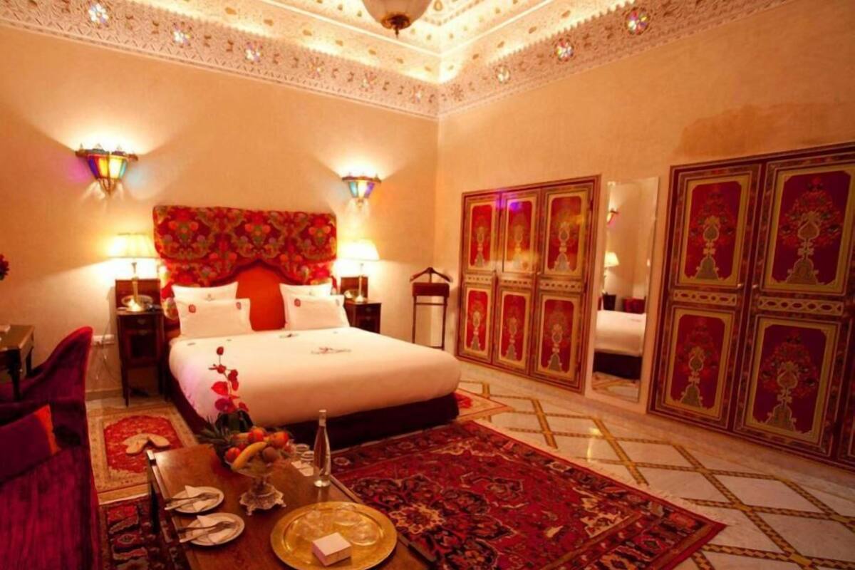 Executive Suite | Premium bedding, minibar, in-room safe, blackout drapes