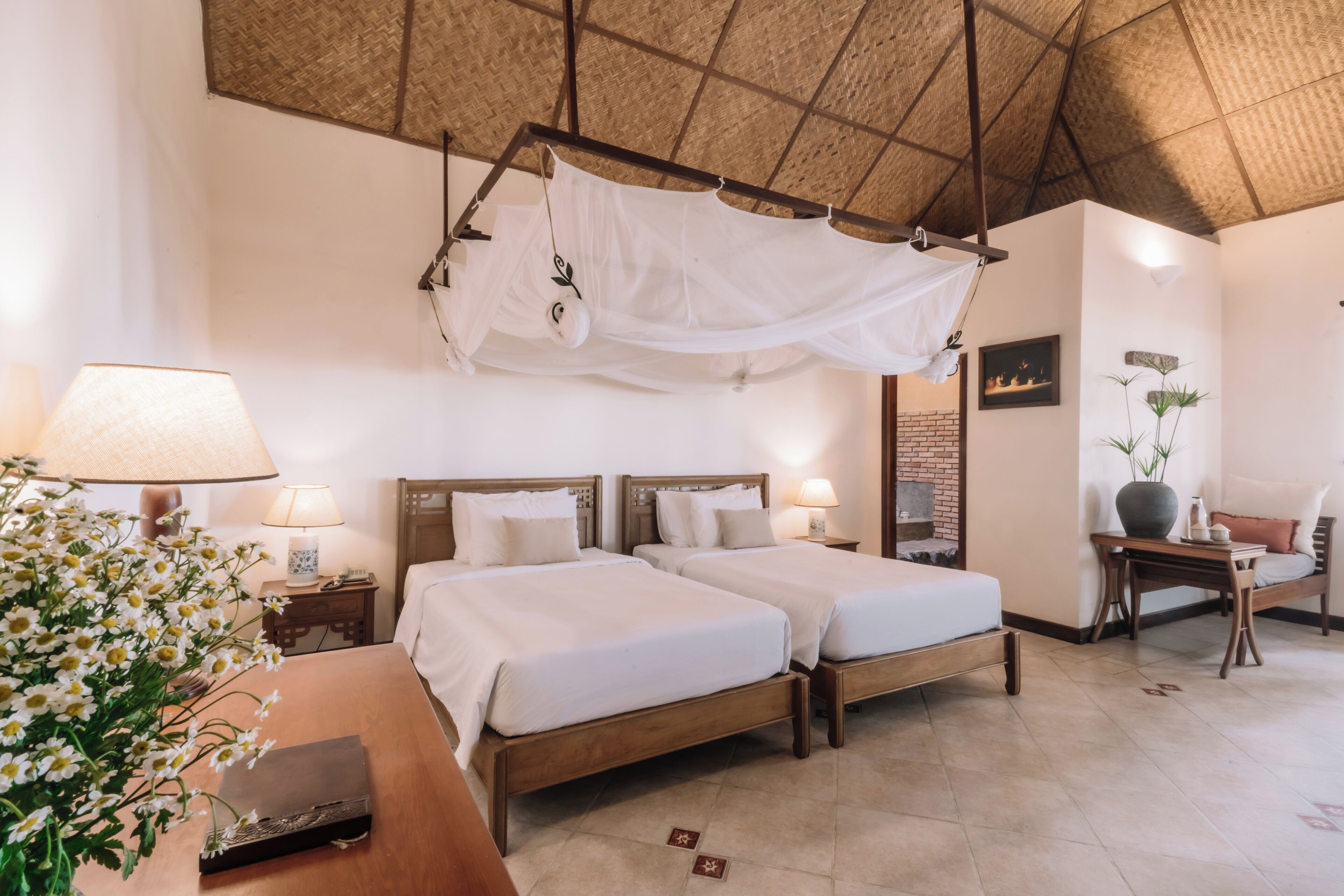 Bungalow Premier, vista al océano | Camas con pillow-top, minibar y caja de seguridad en la habitación 