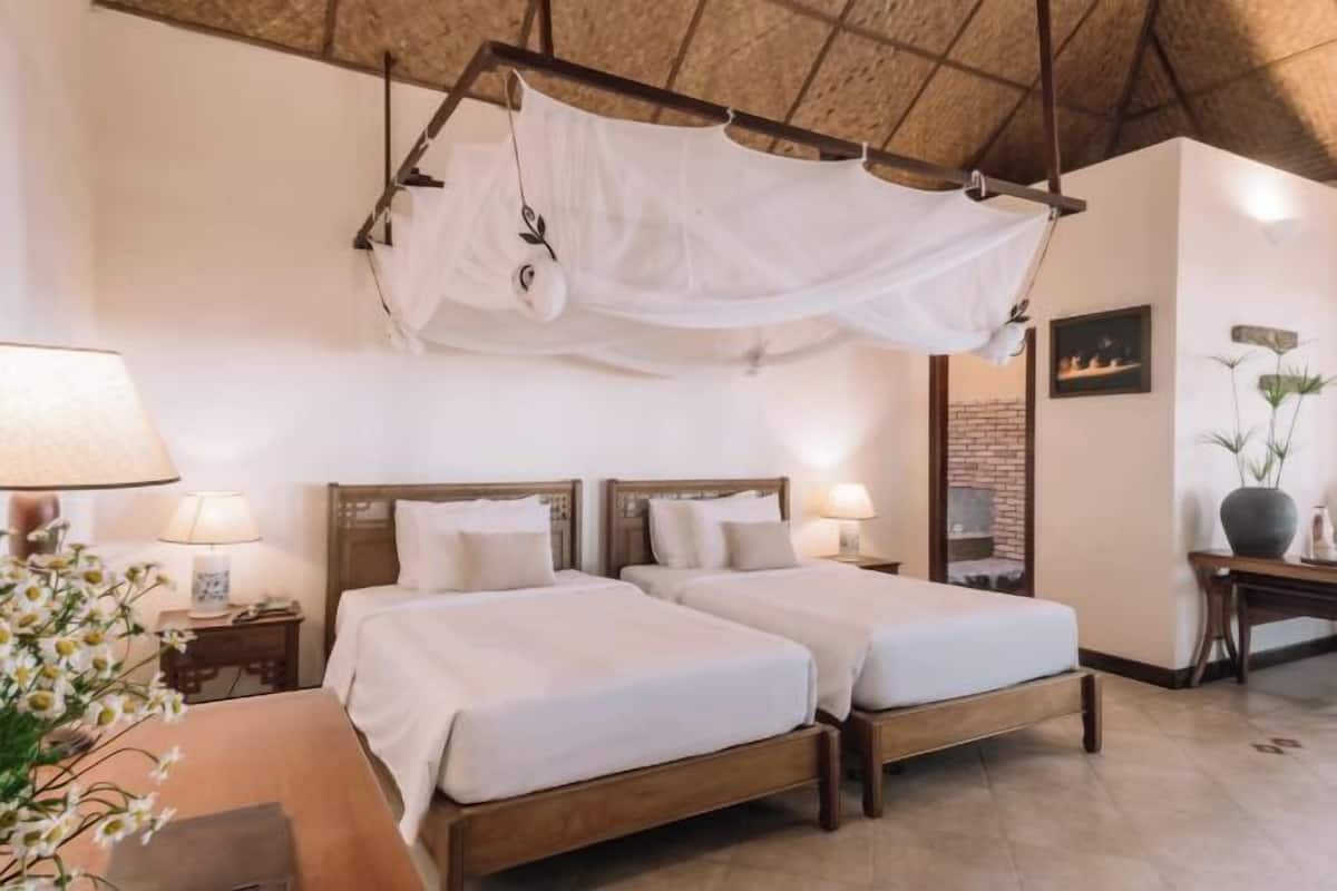 Pillowtop-bedden, een minibar, een kluis op de kamer, een bureau