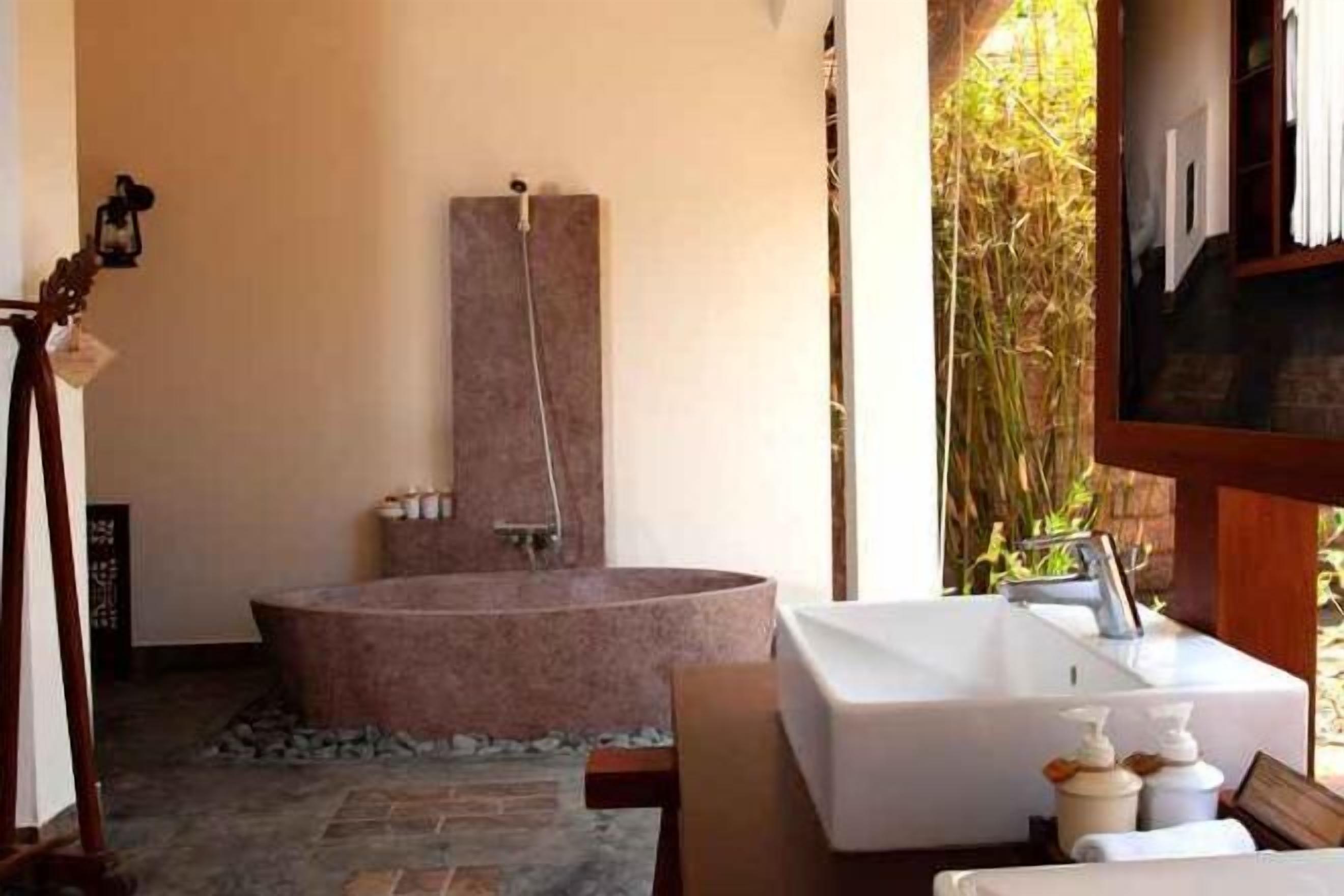 Bathroom | Rainfall showerhead, free toiletries, hair dryer, bathrobes