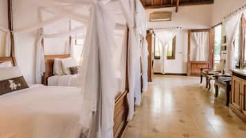 Premier Garden Room | Pillowtop beds, minibar, in-room safe, desk