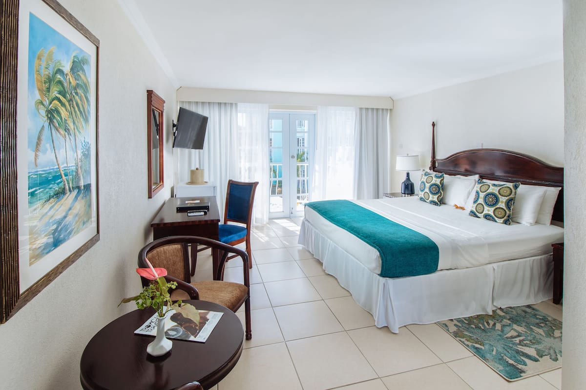 superior room, 1 king bed | in-room safe, desk, iron/ironing board, free cots/infant beds