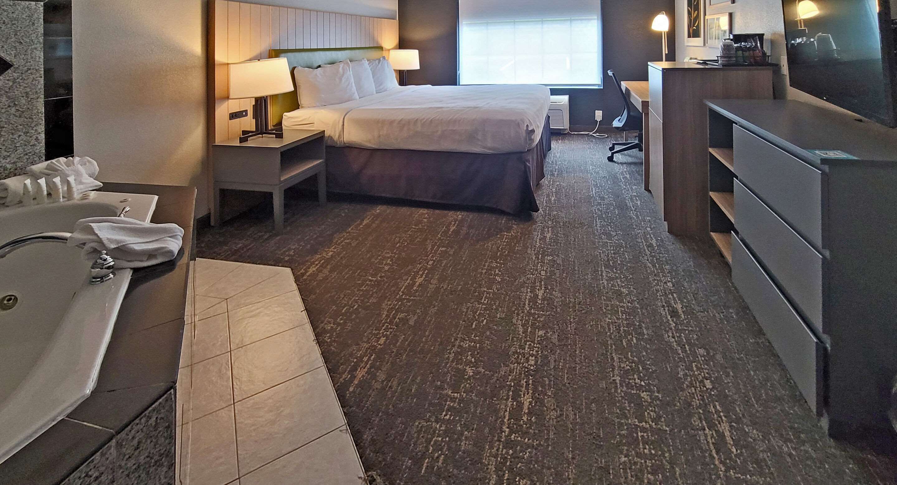 desk, blackout curtains, iron/ironing board, free cots/infant beds