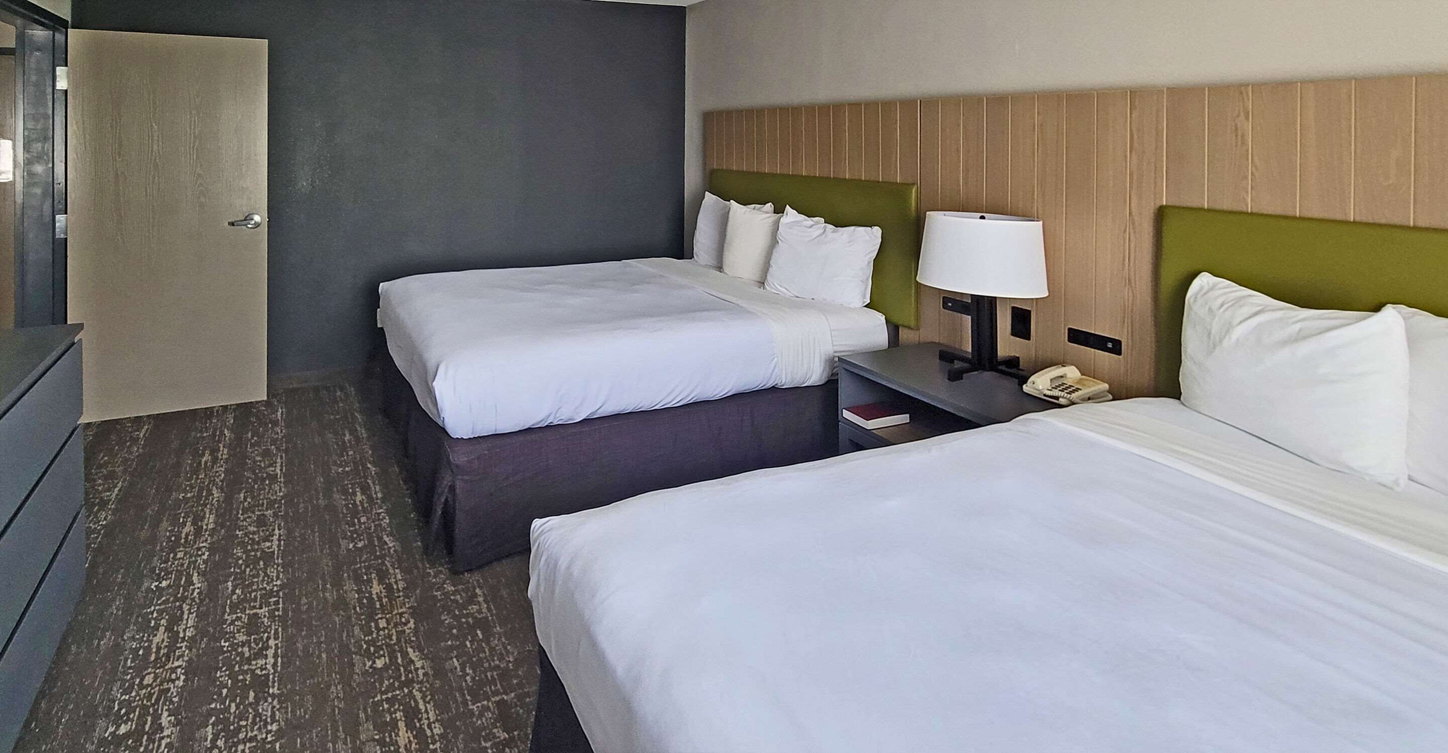 desk, blackout curtains, iron/ironing board, free cots/infant beds