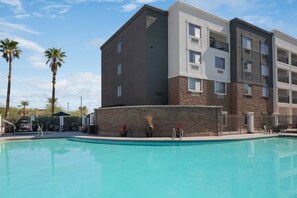 Outdoor pool, open 9:00 AM to 10:00 PM, pool umbrellas, sun loungers