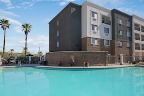Outdoor pool, open 9:00 AM to 10:00 PM, pool umbrellas, sun loungers
