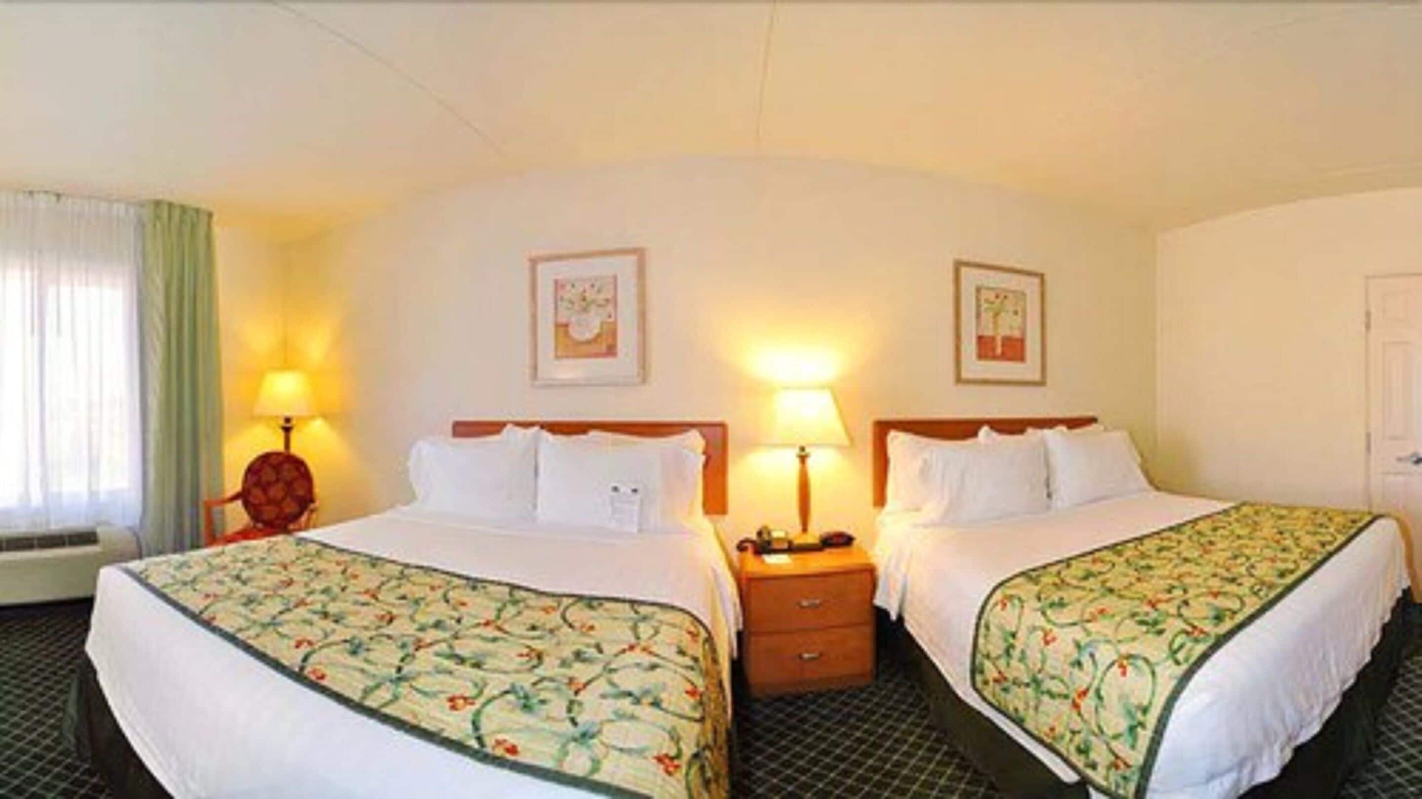 Room, 2 Queen Beds | In-room safe, desk, laptop workspace, blackout drapes