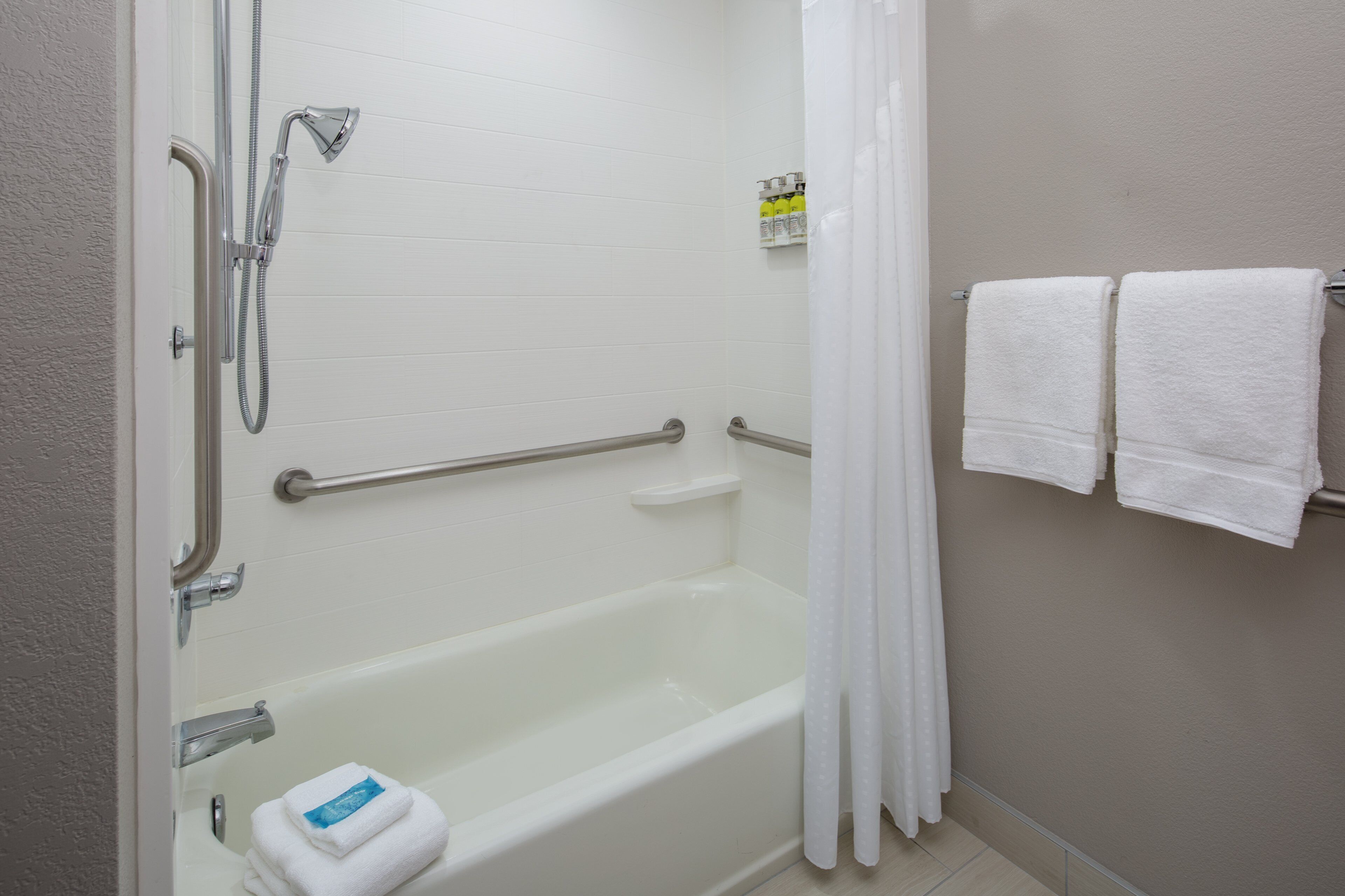 combined shower/bathtub, free toiletries, hair dryer, towels