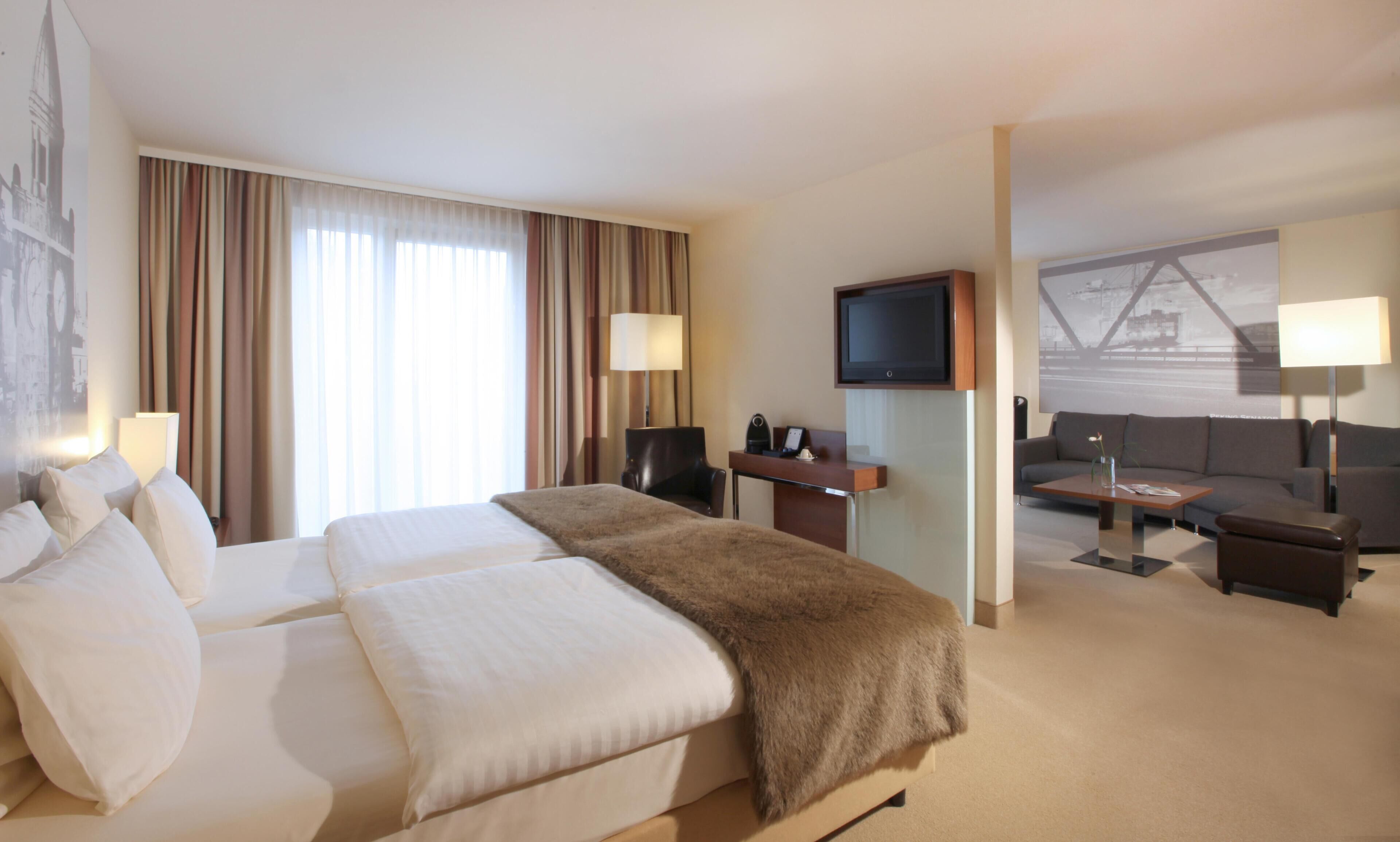 Hypo-allergenic bedding, in-room safe, laptop workspace