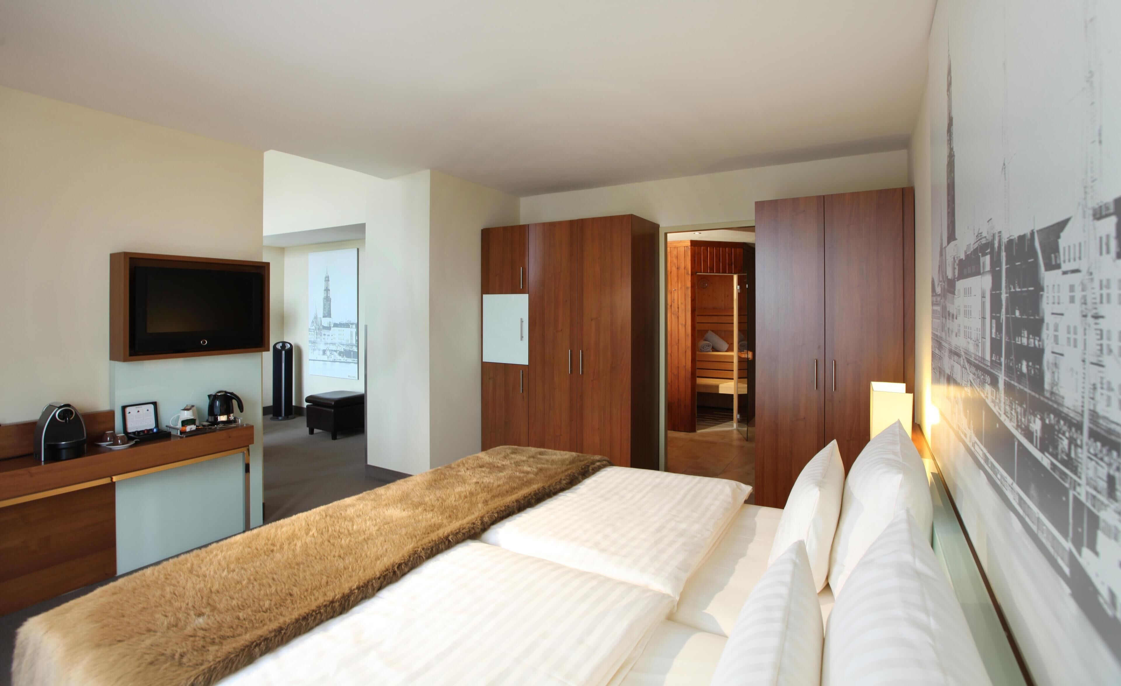 Hypo-allergenic bedding, in-room safe, laptop workspace