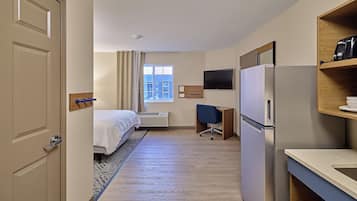 Studio Suite, 1 Queen Bed | 1 bedroom, desk, iron/ironing board, free WiFi
