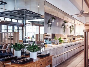 Daily buffet breakfast (AUD 42 per person)