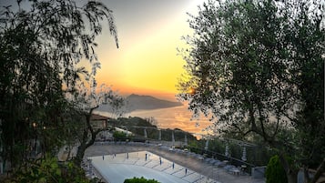 Outdoor pool, pool umbrellas, pool loungers