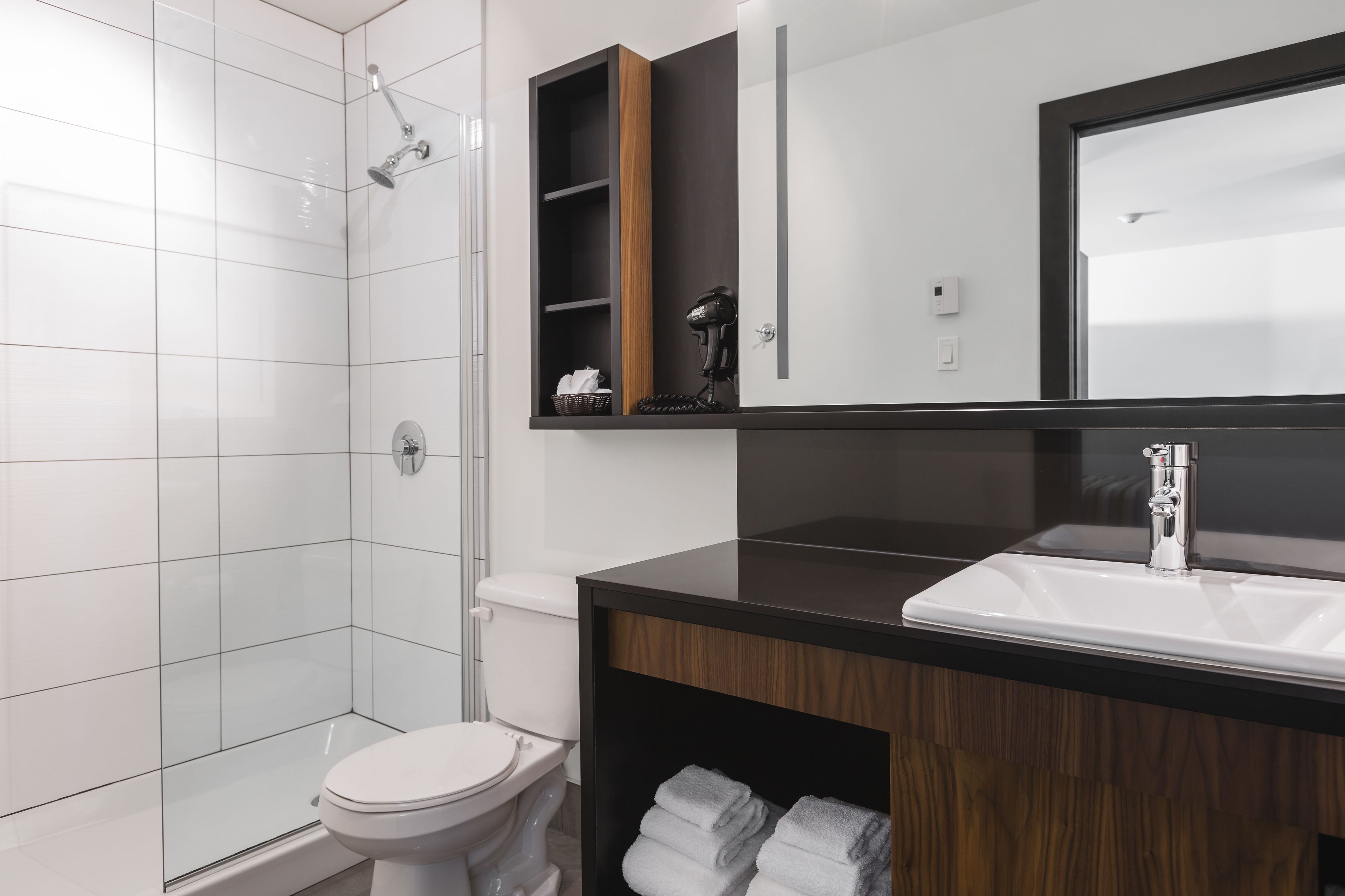 eco-friendly toiletries, hair dryer, towels, soap