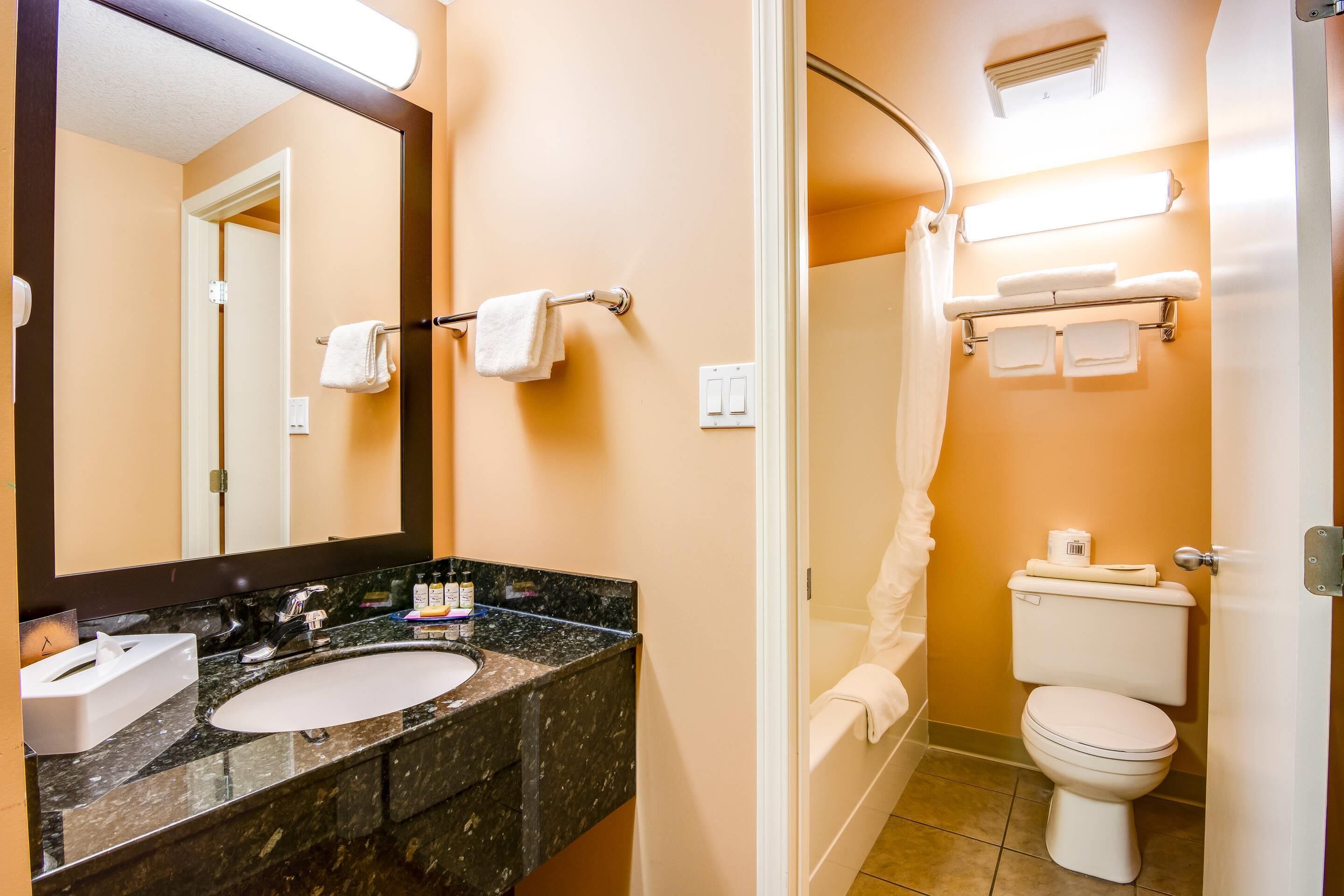 premium bedding, desk, laptop workspace, iron/ironing board