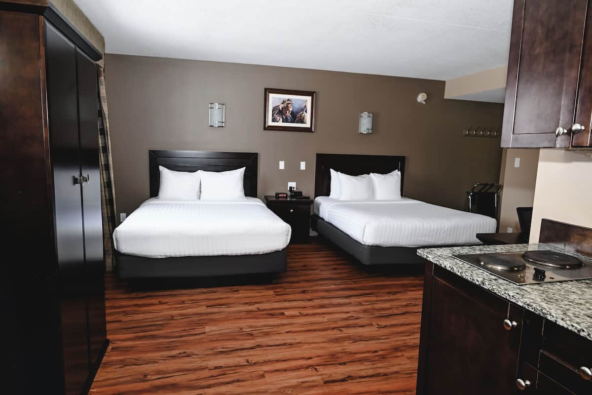 room, 2 double beds, kitchenette | premium bedding, desk, laptop workspace, iron/ironing board