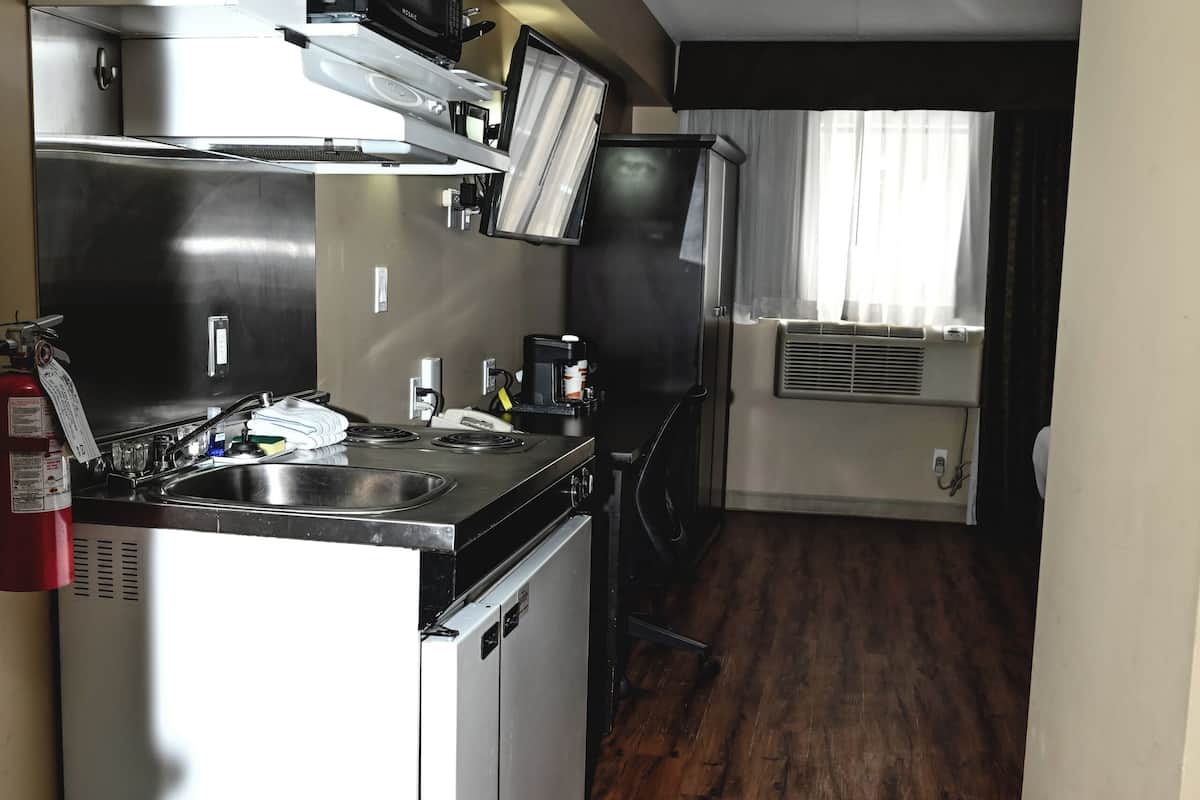 standard room, 2 queen beds (with mini kitchenette) | private kitchenette | fridge, microwave, coffee/tea maker, cookware/dishes/utensils