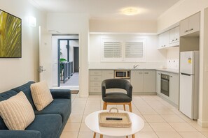 Deluxe Apartment, 1 Bedroom | Living area | Flat-screen TV - Blue Lagoon Resort (Trinity Beach)