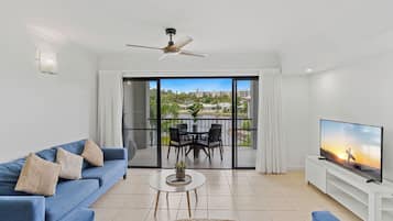 Superior Apartment, 2 Bedrooms, Lagoon View | Living area | Flat-screen TV