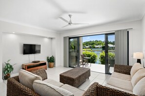 Standard Apartment, 2 Bedrooms | Living area | Flat-screen TV - Blue Lagoon Resort (Trinity Beach)