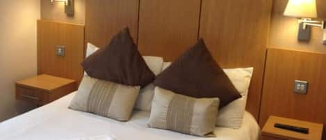 Premium bedding, laptop workspace, iron/ironing board, free WiFi