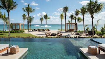 6 piscinas al aire libre, camas de piscina gratis, sombrillas