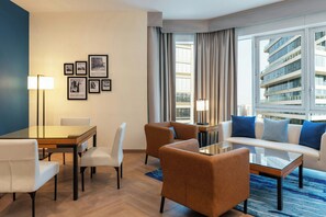 Suite, 1 Bedroom, Non Smoking - Complimentary Shuttle Service to Dubai Mall and Kite Beach | Living room | 32-inch LCD TV with satellite channels, TV - Four Points by Sheraton Bur Dubai (Dubai)