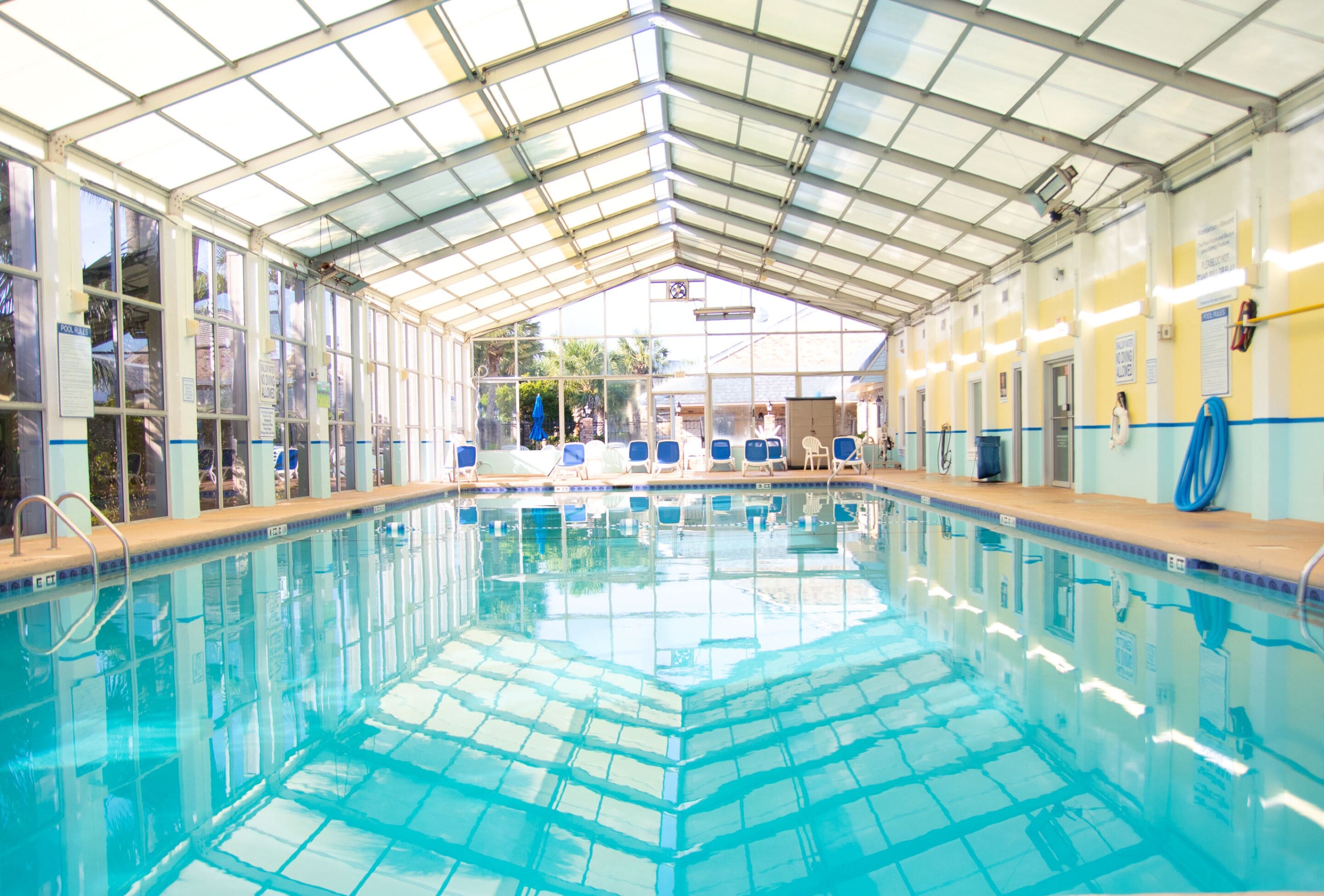 indoor pool, outdoor pool, pool umbrellas, pool loungers