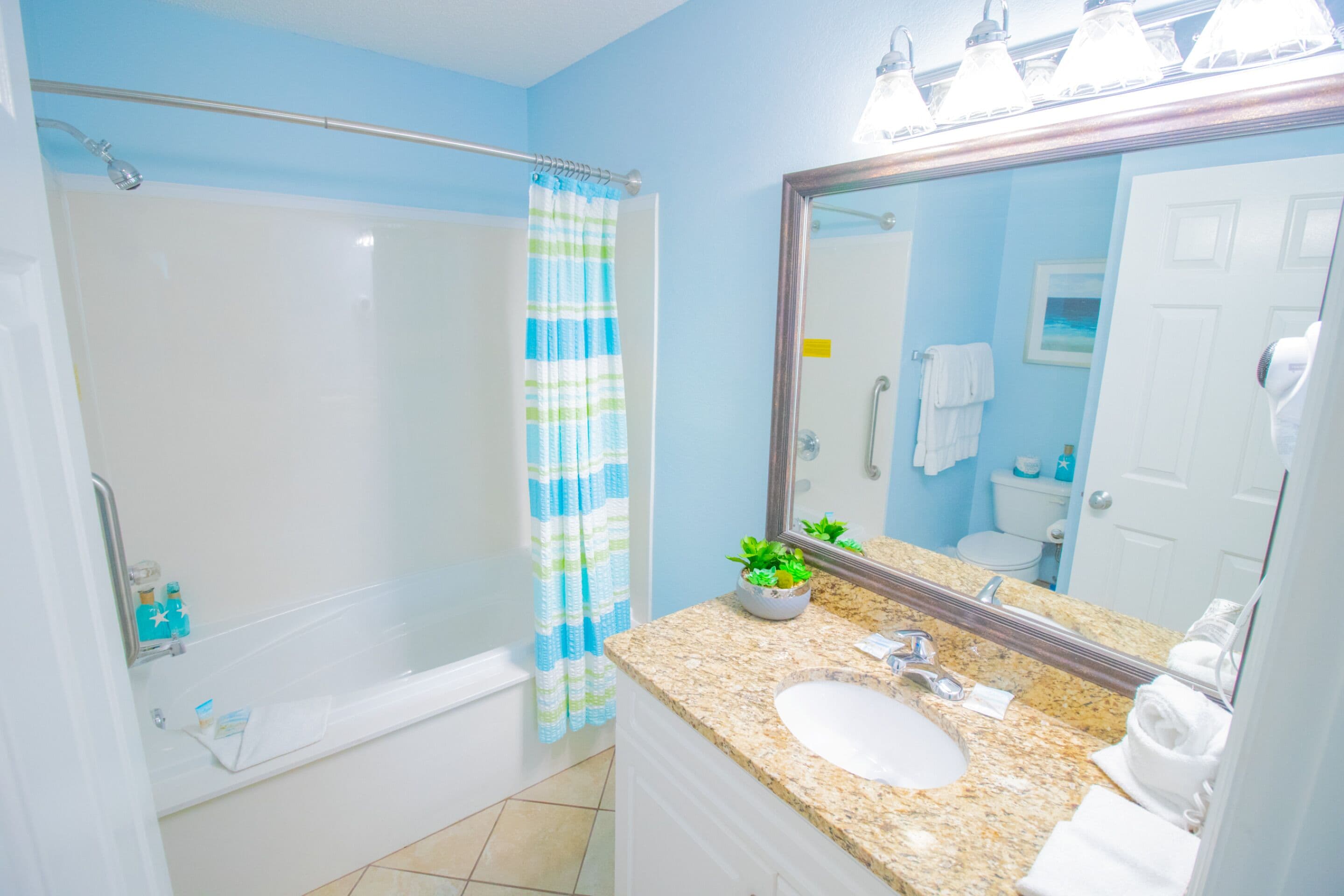 hair dryer, towels, shampoo