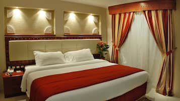 Deluxe Suite | 1 bedroom, in-room safe, desk, blackout drapes