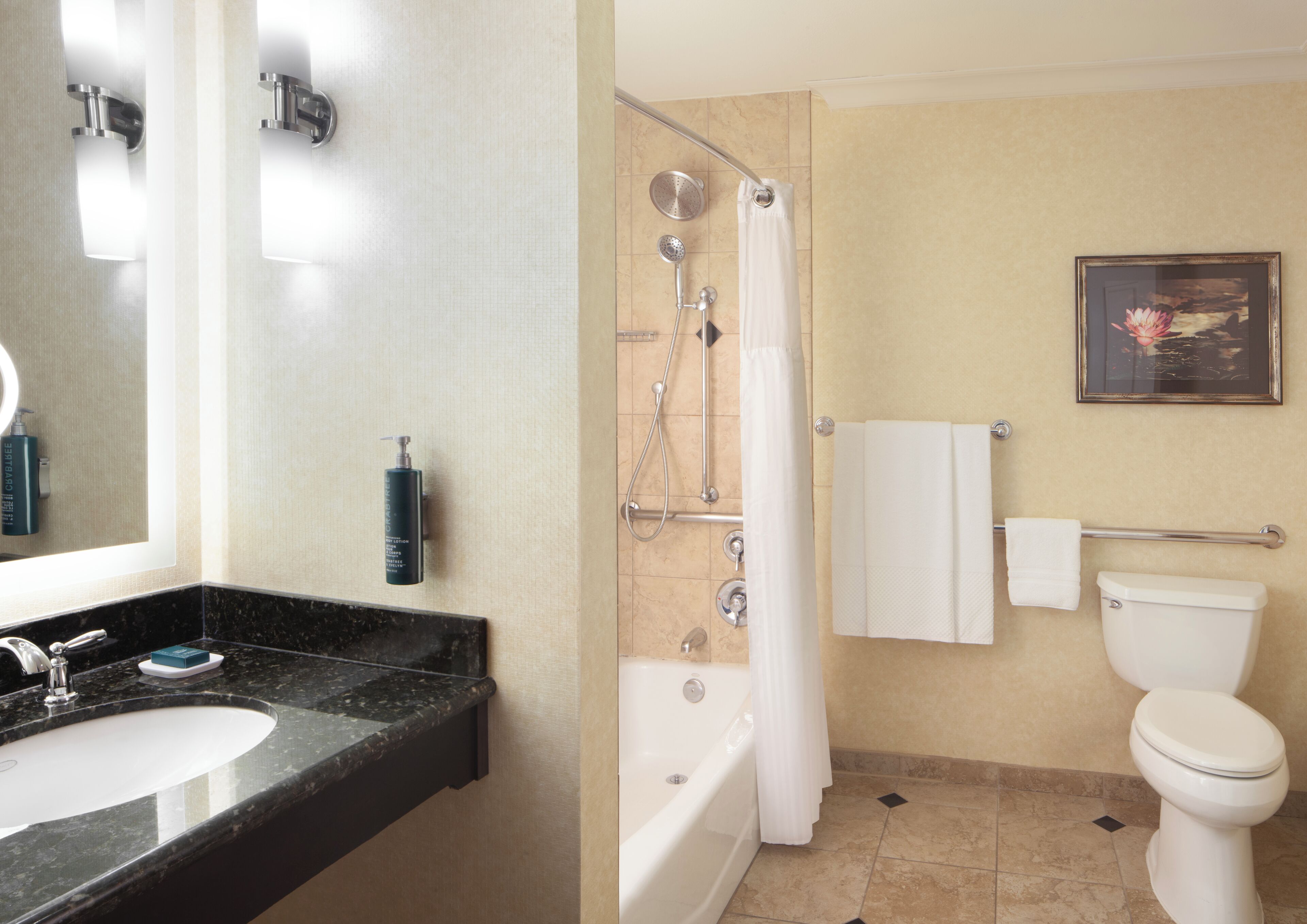 Designer toiletries, hair dryer, towels, soap