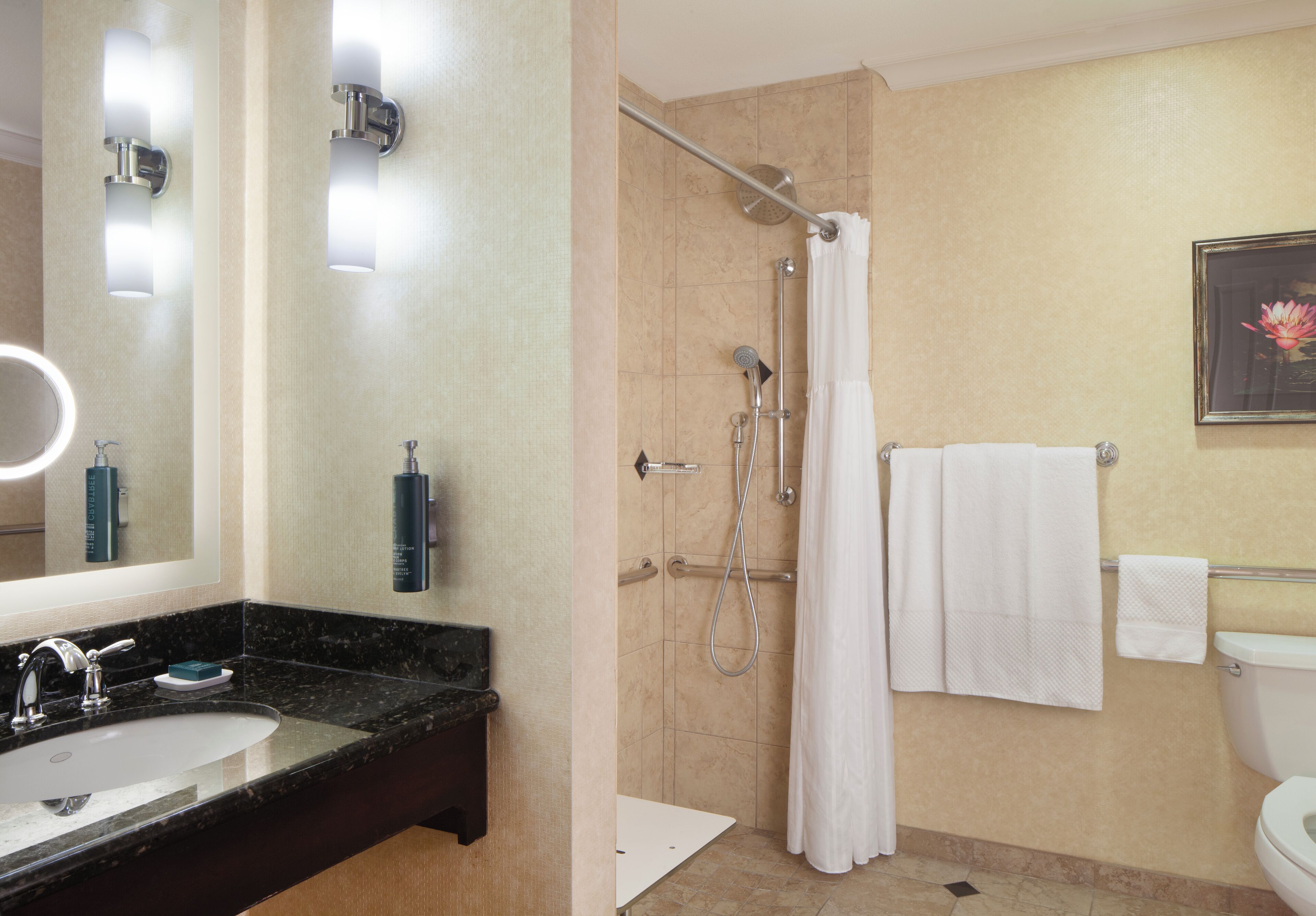 Designer toiletries, hair dryer, towels, soap