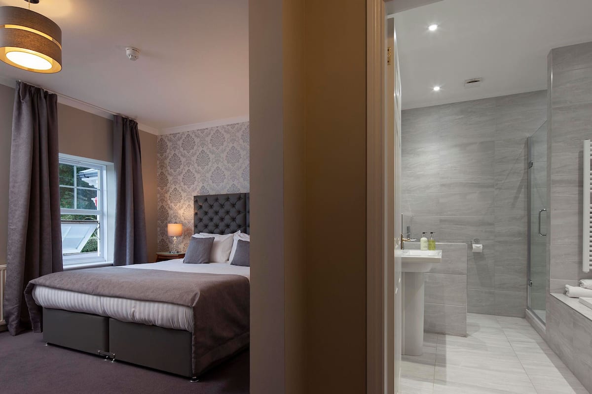 family room | desk, iron/ironing board, bed sheets