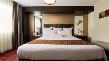 Ropa de cama de alta calidad y tabla de planchar con plancha