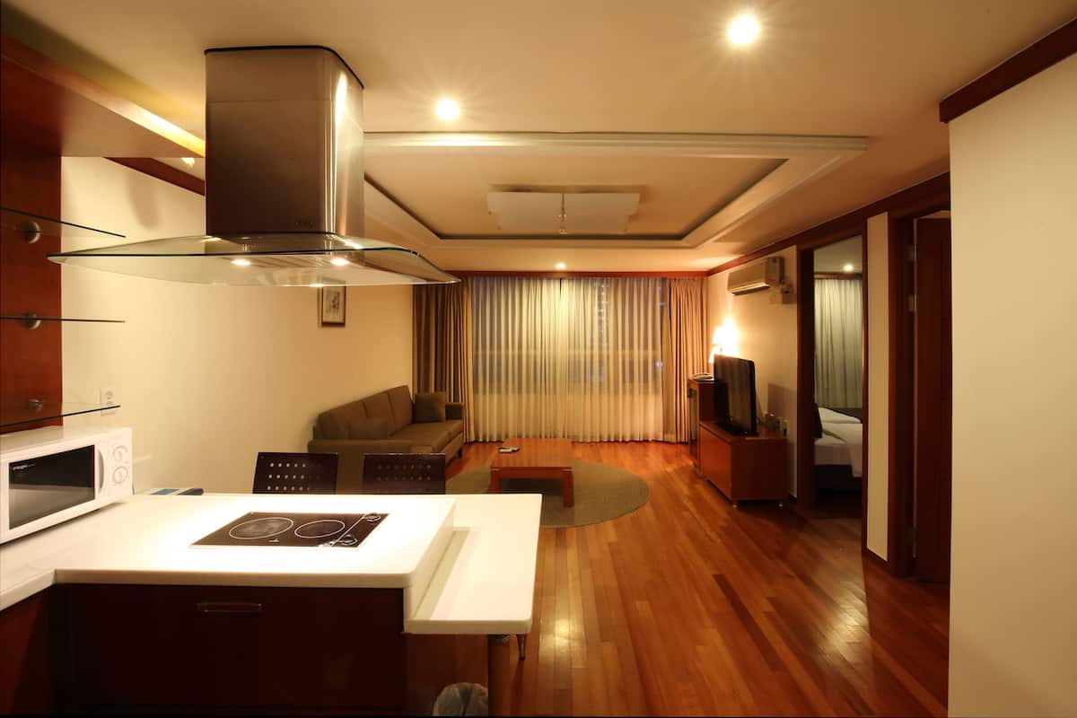 Suite (Coatel) | Living area | Flat-screen TV