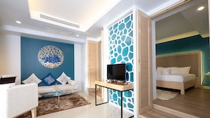 Suite | Living area | 24-inch TV with satellite channels - The Royal Palm Beachfront (Patong)